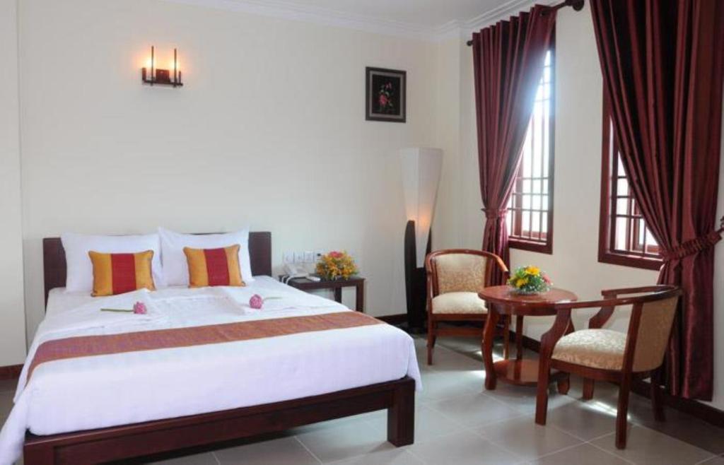 V N E Hotel Phnom-Penh Kamer foto